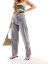 TOPSHOP - Hourglass Cinch Low Rise Relaxed Jeans - Lyst