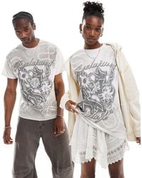 Reclaimed (vintage) - – verwaschenes unisex-t-shirt mit oversize-schnitt und spray-grafikprint - Lyst