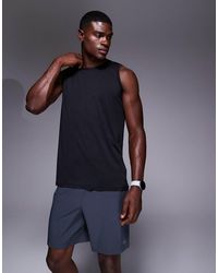 4505 - Icon Training Sleeveless Relaxed Tank With Quick Dry - Lyst