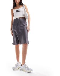 Monki - Satin A-line Midi Skirt With Front Bow Detail - Lyst