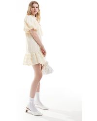 Ghospell - Vestido corto blanco con mangas abullonadas y acabado texturizado - Lyst