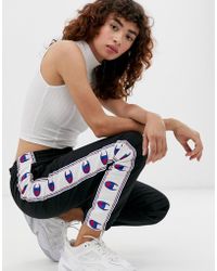 Champion Reverse Weave Relaxed joggers With Logo Tape - Black