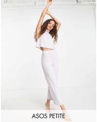 Pantaloni con fondo ampio e frange a strati coordinatiASOS in Materiale  sintetico di colore Nero | Lyst