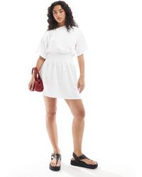 ASOS - Vestido Corto Estilo Camiseta Con Vuelo Y Cuello Barco De -Sin Color - Lyst