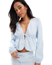 Pieces - Blouse d'ensemble courte en coton froissé avec liens noués à l'avant - clair - Lyst