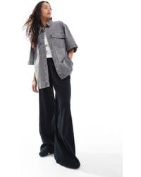 ONLY - – kurzärmliges oversize-hemd aus em denim mit brusttasche vorne - Lyst