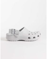 Crocs™ - Classic Metallic Buckle Clogs - Lyst