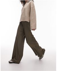 TOPSHOP - Pantaloni a fondo ampio kaki plissé - Lyst