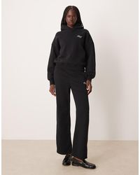 Abercrombie & Fitch - Ruimvallende Joggingbroek Met Hoge Taille En Logo Aan De Zijkant - Lyst