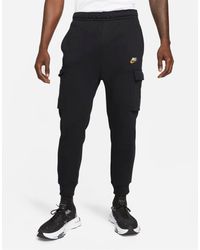 Pantalones Nike de hombre: hasta el 57 % de descuento | Lyst
