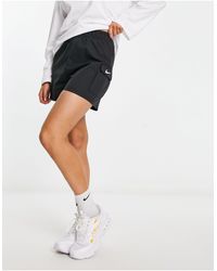 Nike - Pantalones cortos s cargo con logo pequeño y bolsillos - Lyst
