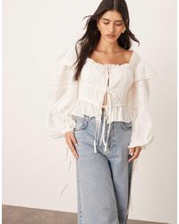 ARRANGE - Cotton Voile Lace Trim Blouse With Tie Front - Lyst