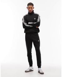 adidas Originals - Three Stripe joggers - Lyst