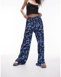 TOPSHOP - Pantaloni con fondo ampio cobalto sfumato plissé stropicciato - Lyst