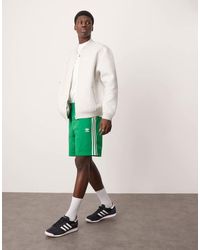 adidas Originals - Pantalones Cortos Verdes Adicolor Firebird De - Lyst