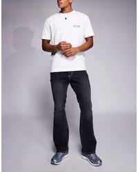 Liquor N Poker - Stacked Slim Flare Denim Jeans - Lyst