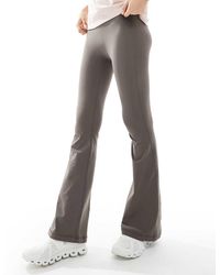 agon® - Flared Leggings - Lyst
