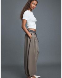 Stradivarius - Voluminous Sarouel Trousers With Tie Belt - Lyst