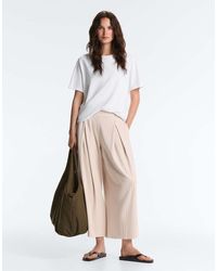 Oysho - Wide-Leg Crop Trousers With Pleats And Stripes - Lyst