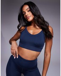 4505 - Icon Active Medium Support Sports Bra With Removable Padding And Adjustable Straps - Lyst