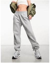 Nike mini metallic swoosh oversized pastel colour block joggers new arrivals