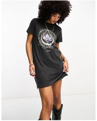 ONLY - Vestido corto negro lavado estilo camiseta con estampado gráfico - Lyst