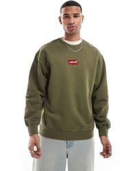 Levi's - – olives sweatshirt mit batwing-logoapplikation und lockerem schnitt - Lyst