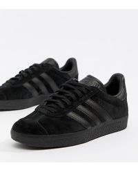 triple black gazelle suede
