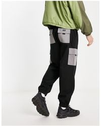 New Look - Pantaloni cargo neri con tasche a contrasto - Lyst