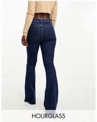 ASOS - Hourglass - jeans a zampa super elasticizzati scuro - Lyst