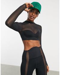 Women's Ivy Park Tops from $45 | Lyst