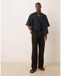 ASOS - Pantalones De Vestir Negros De Pernera Ancha Con Pinzas Dobles Y Cinturón De - Lyst