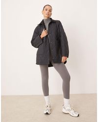 Tala - – wendbare oversize-jacke aus gestepptem fleece - Lyst