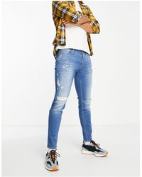 Vaqueros Hollister de hombre: hasta el 60 % de descuento | Lyst