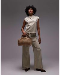 Mango - Broek Van Polyamide Met Wijde Pijpen En Gestrikte Taille - Lyst