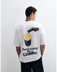 ASOS - Oversized T-shirt With Guinness Print - Lyst