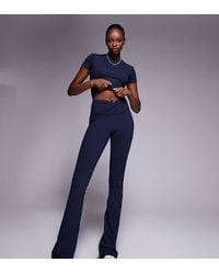 4505 - Tall Icon Wrap Waist Slim Kick Yoga leggings - Lyst