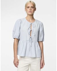 Pieces - Top à manches bouffantes - denim délavé - Lyst