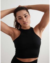 Aim'n - Top Modellante Senza Cuciture Con Scollo A Vogatore - Lyst