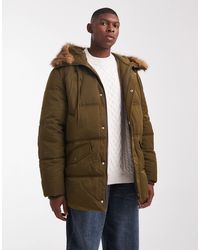 ASOS - Doudoune avec capuche en fausse fourrure - foncé - Lyst