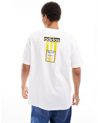 adidas Originals - T-shirt bianca e gialla con logo - Lyst