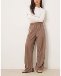adidas Originals - Pantalones De Chándal Marrones Firebird De -Marrón - Lyst