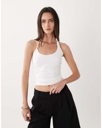 SNDY'S - Top Bianco Con Scollo Rotondo E Perline - Lyst