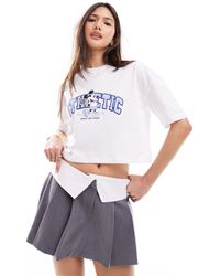 Miss Selfridge - – disney – t-shirt mit "athletic"-micky-maus-grafikprint - Lyst