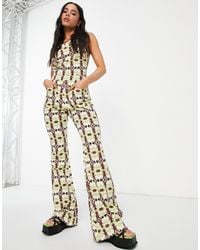 ASOS - – neckholder-jumpsuit mit ausgestelltem bein und geometrischem muster - Lyst