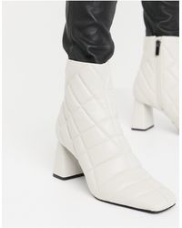 boots stradivarius beige