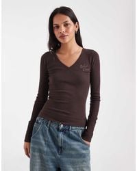 Hollister - Graphic Long Sleeve V Neck T-shirt - Lyst