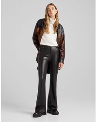 Bershka Faux Leather Flared Pants in 