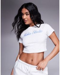 Kaiia - T-shirt crop top d'ensemble riche en coton avec logo script brodé - chiné et bleu - Lyst