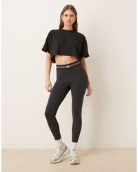 New Balance - Ac Legging 25" - Lyst